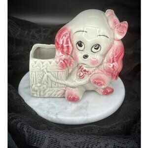 vintage 1950s ceramic sad-eyed spaniel puppy planter.